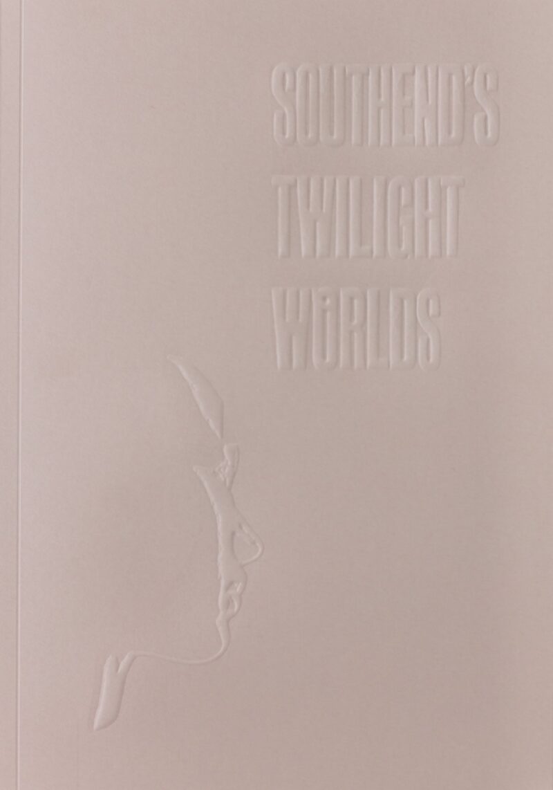 Pale, dirty pink coloured cover with blind embossed title: Southnds' Twilight Worlds and a high contrast human face in profile